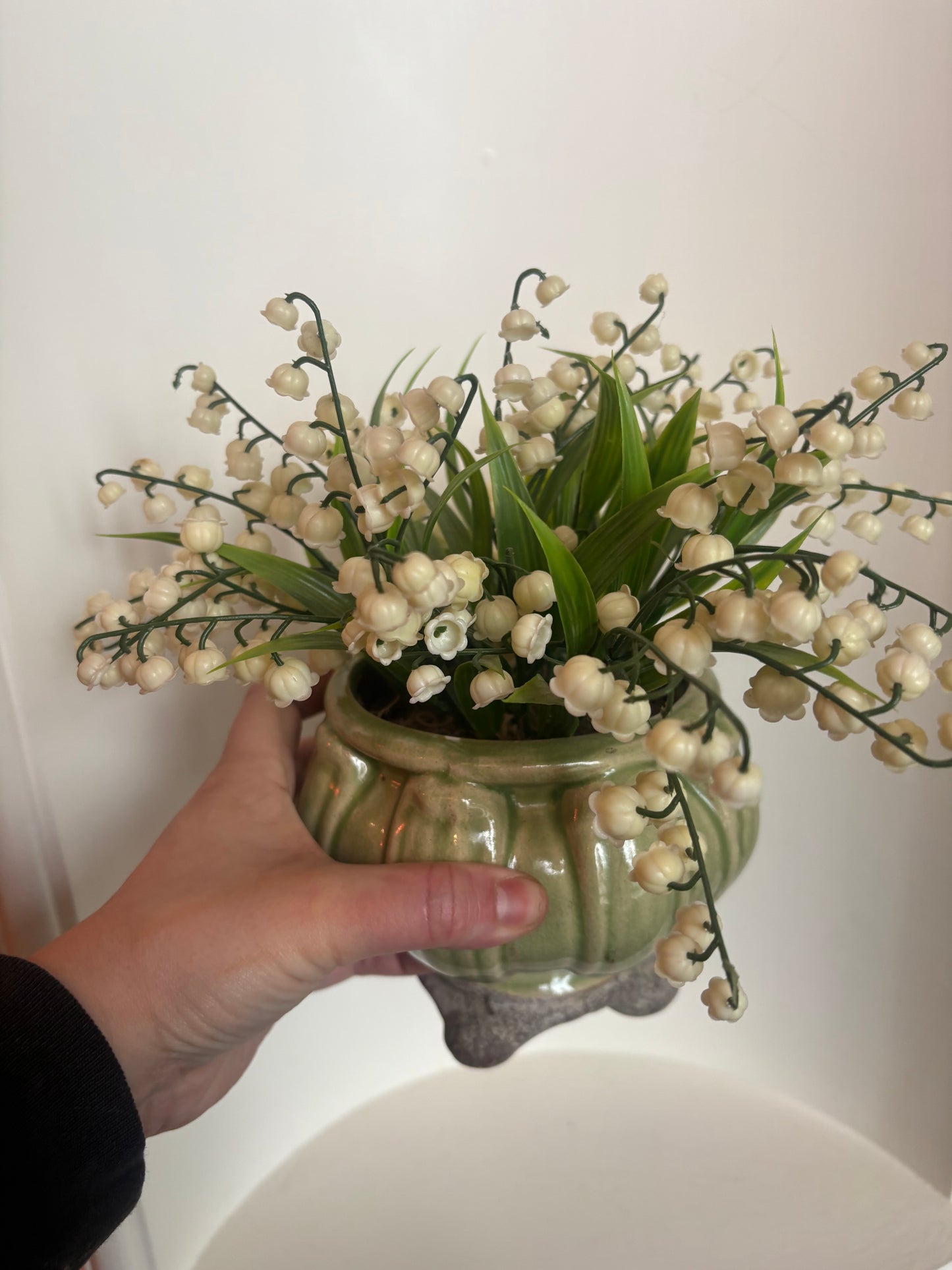 Faux Lily of the Valley in pottery vase