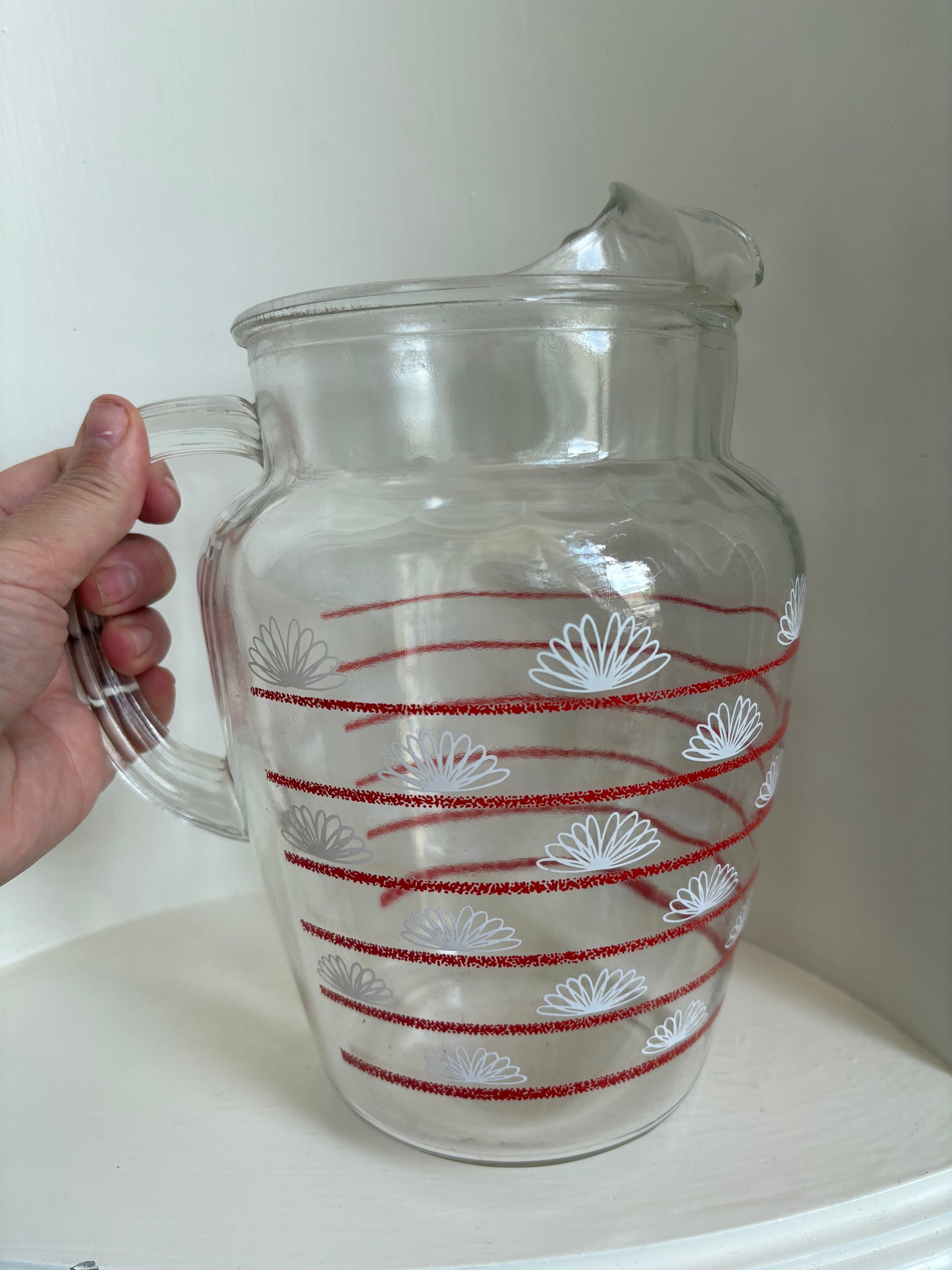 Red stripe juice jug