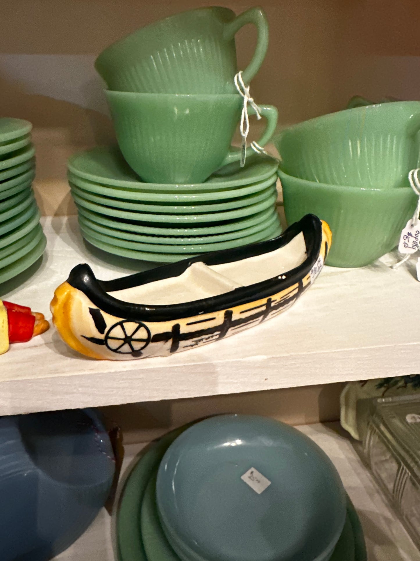 Indigenous people canoe salt & pepper shaker set
