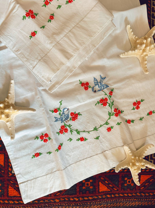 Pair of hand embroidered standard pillowcases - floral & bird details