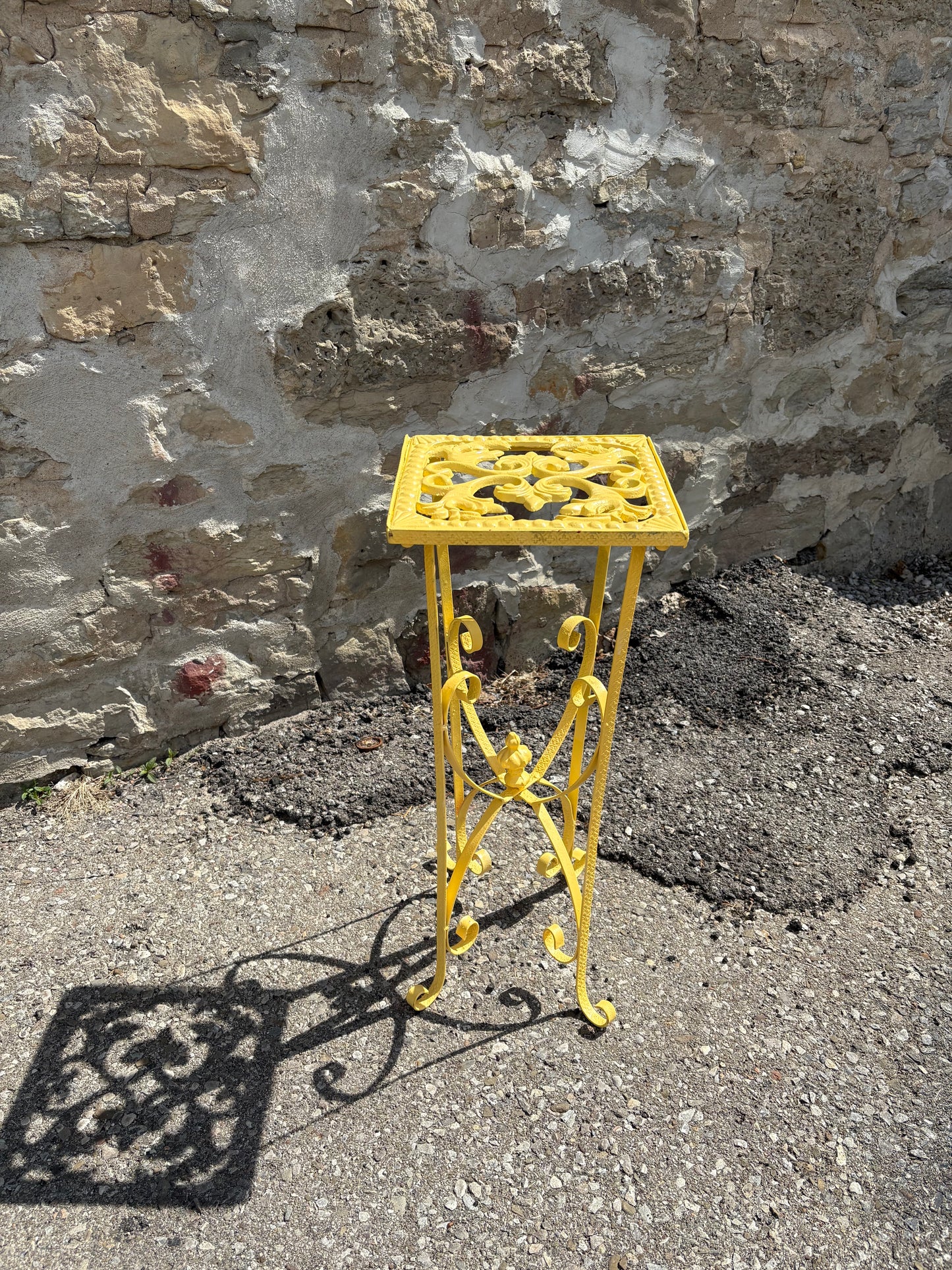 Butter yellow metal plant stand