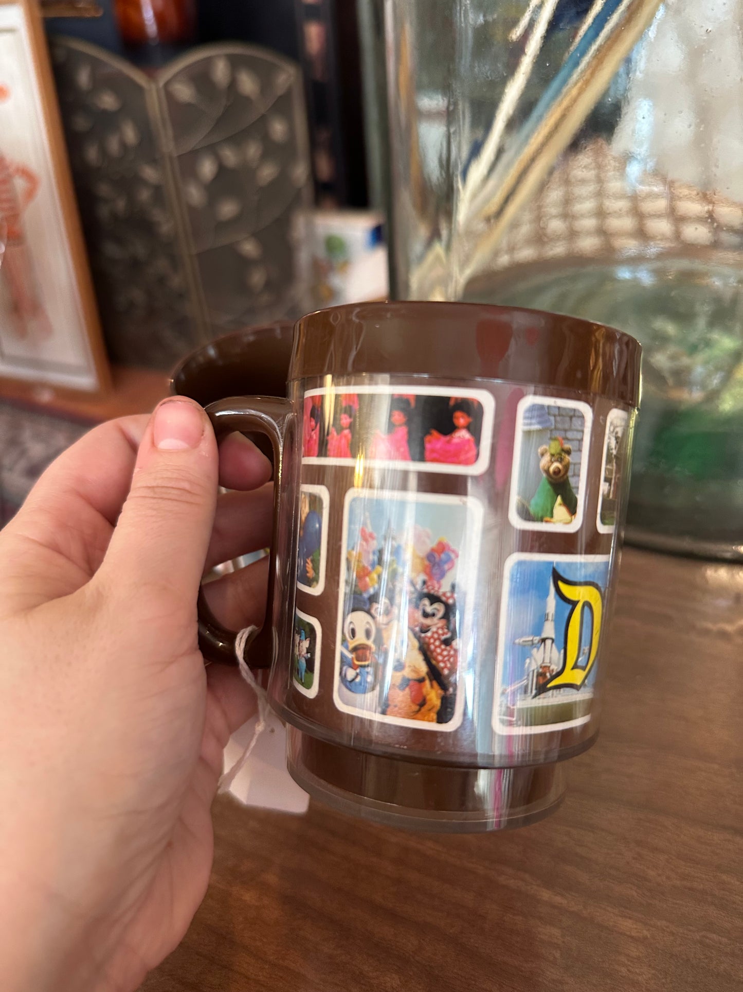 Set of 2 1970s Disneyland Plastic Mugs with images from the park