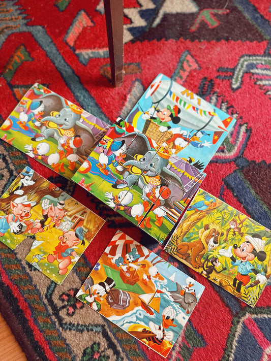 Six sided Disney puzzle! Made in Germany. Comes with 5 photos