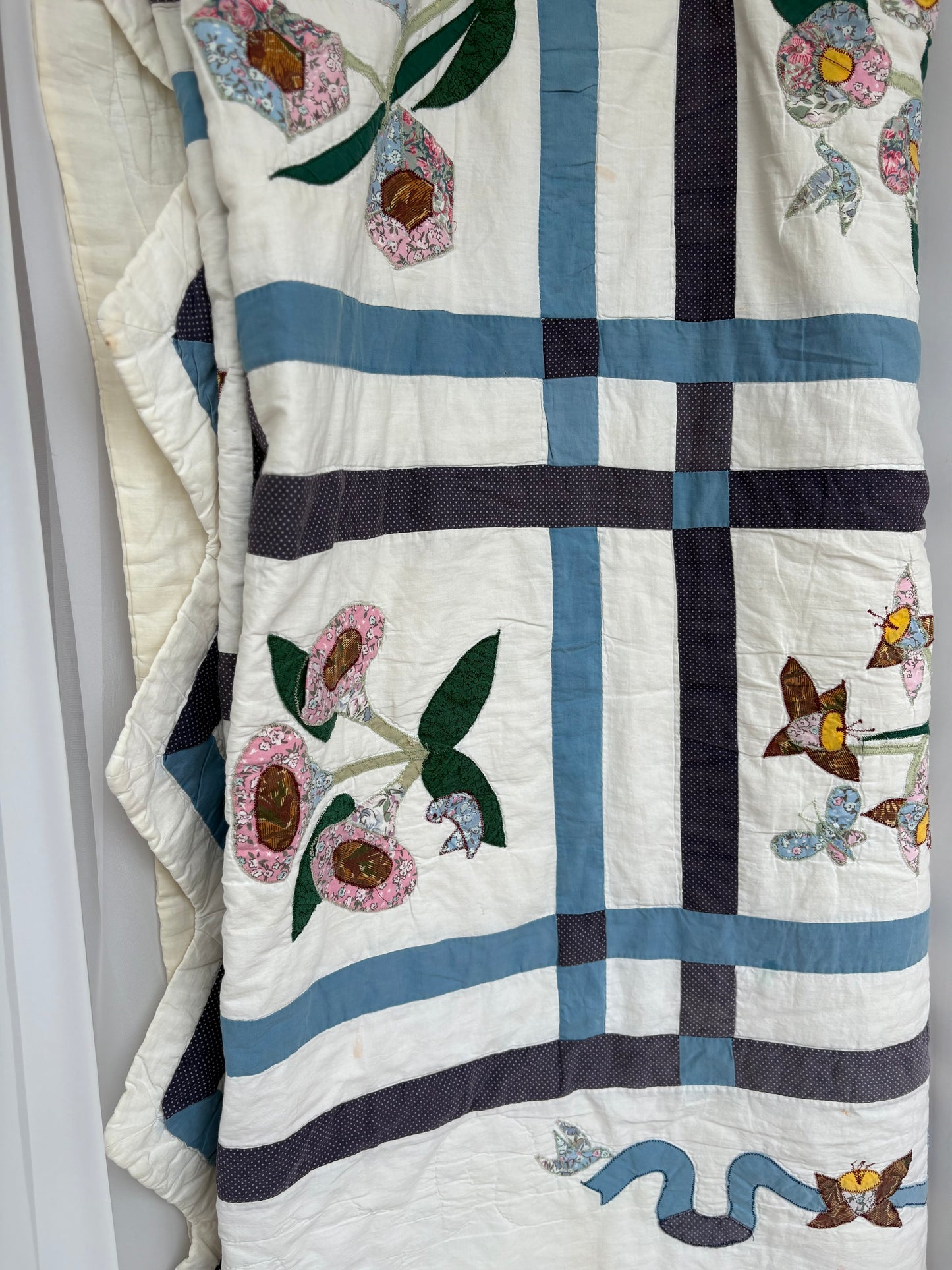 Beautiful Floral Quilt with some wear and tear