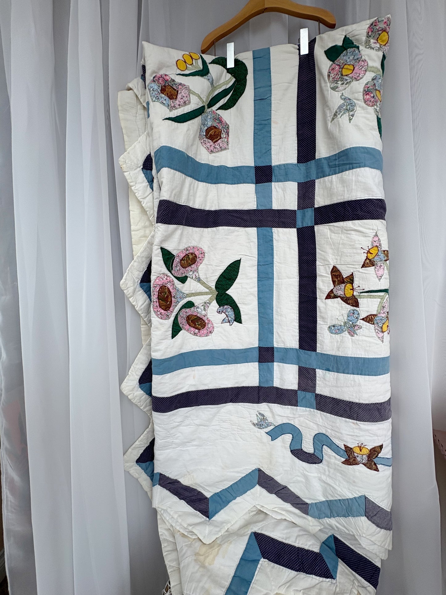 Beautiful Floral Quilt with some wear and tear