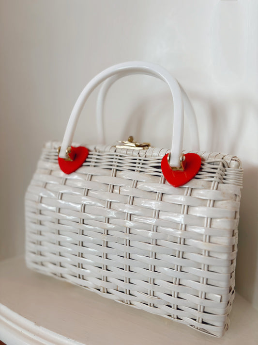 White wicker purse with heart details