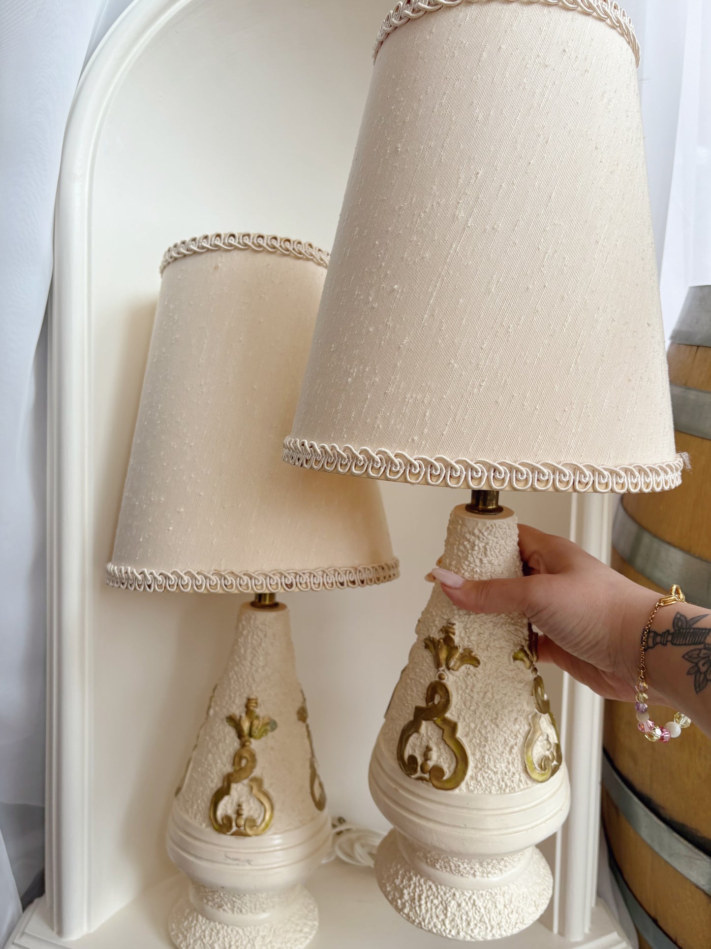 Pair of white lamps with gold detail