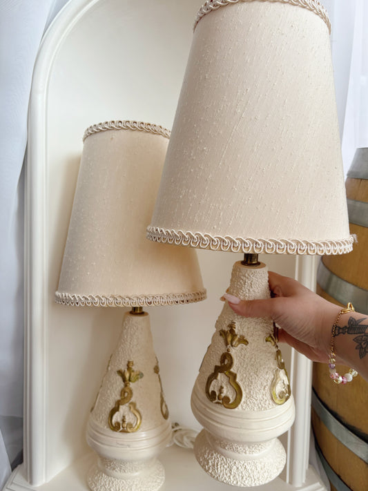 Pair of white lamps with gold detail