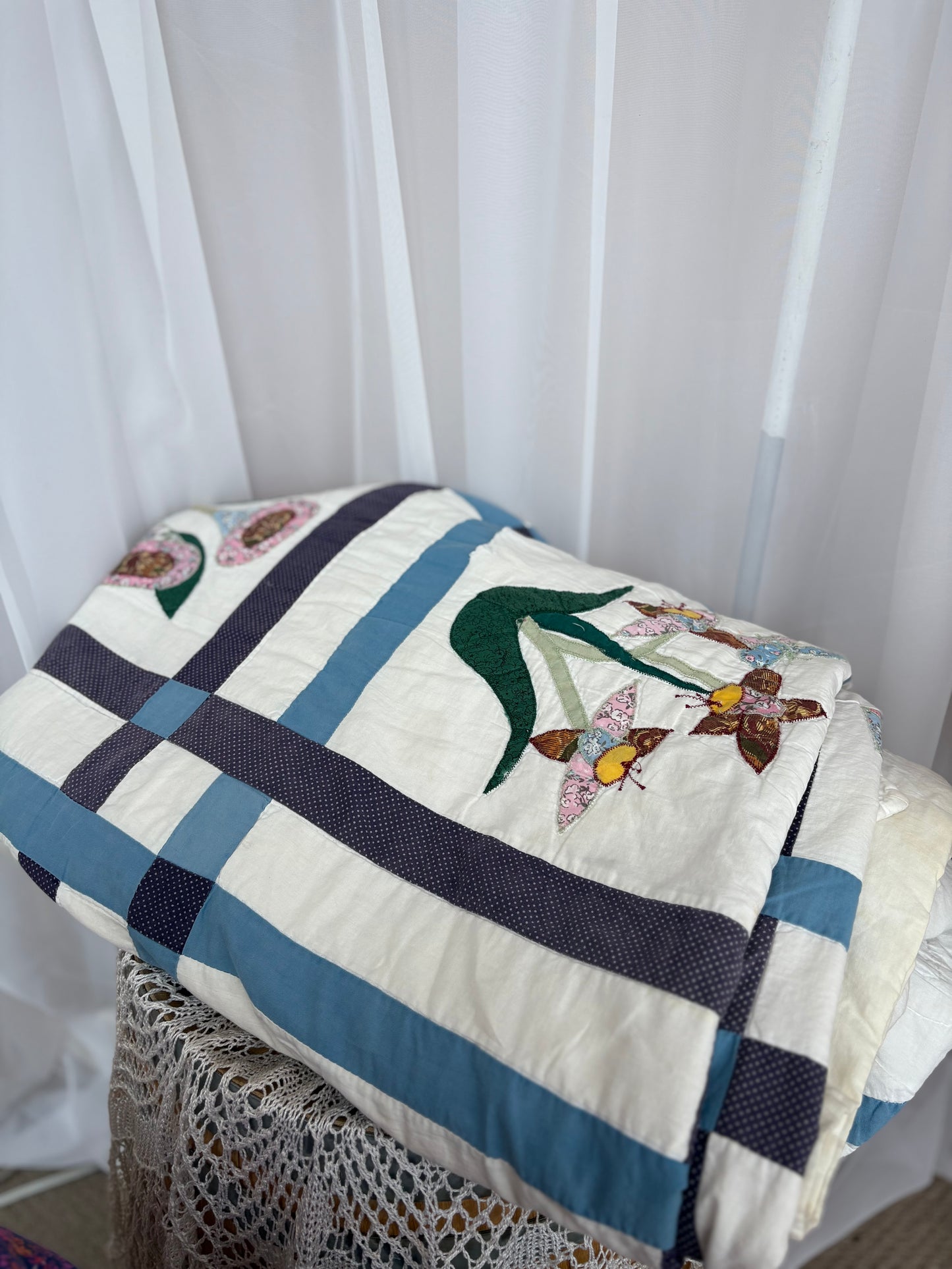 Beautiful Floral Quilt with some wear and tear