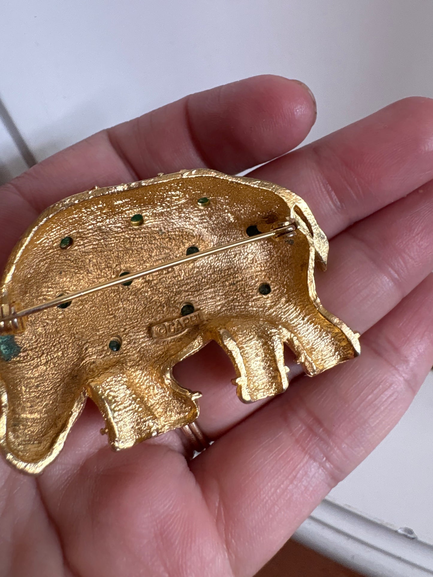 Brooch #17 -Capri Rhino with green glass cabochons
