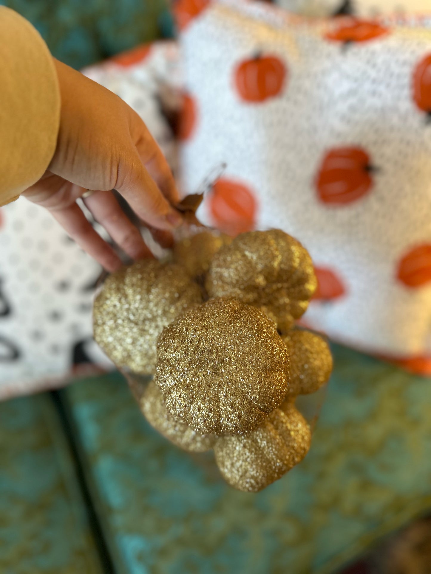 Bag of small glittered gold pumpkin decorations (approx 8 inside)