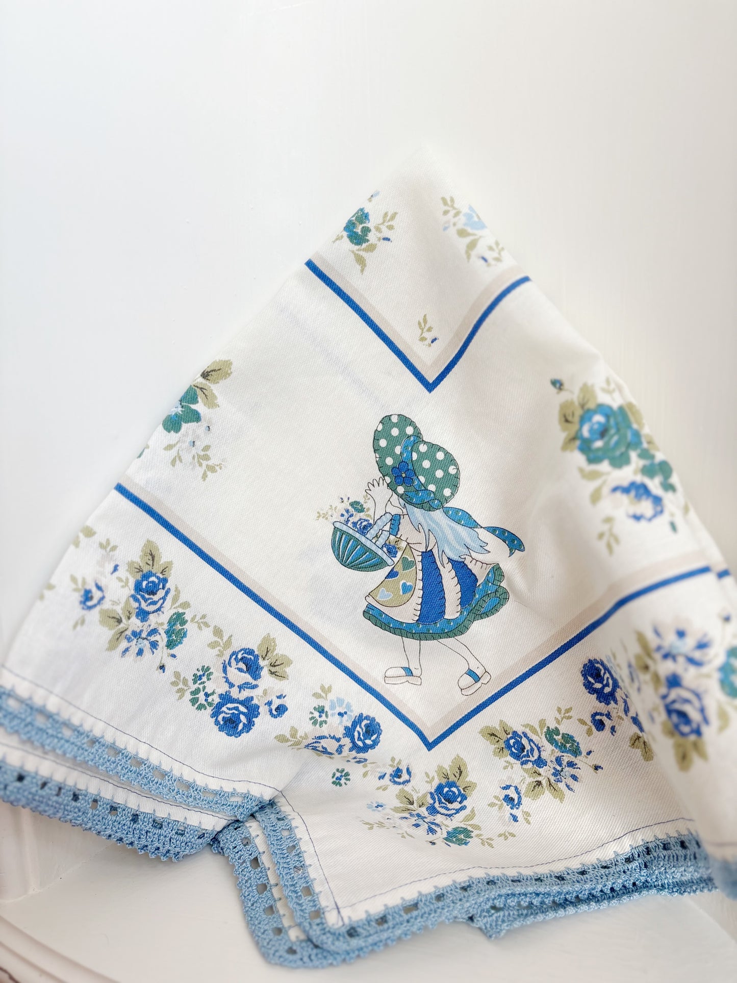 Square blue trim table topper - blue and white with little girl