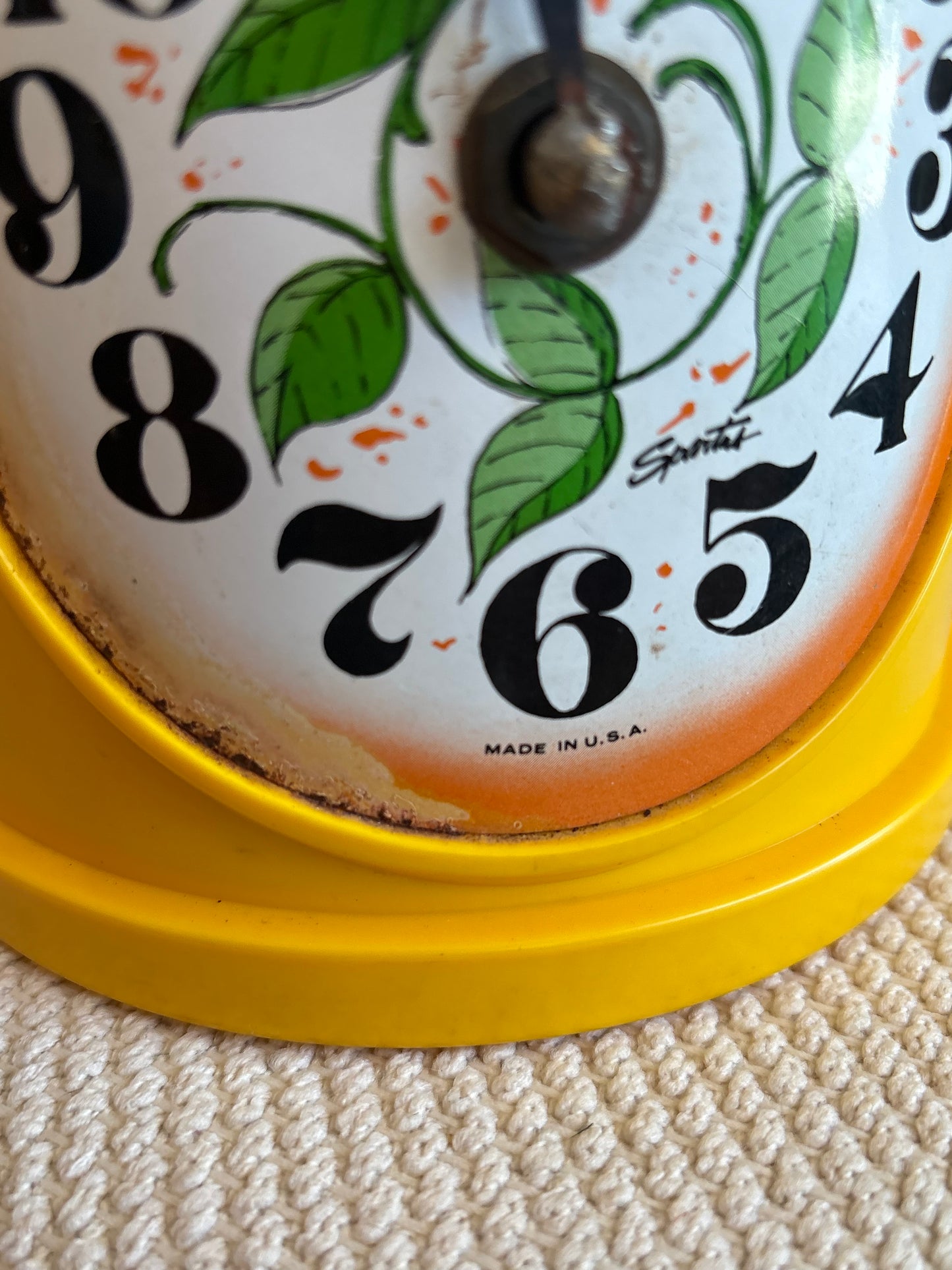 Vintage Watering Can Clock with faux flowers - made in USA