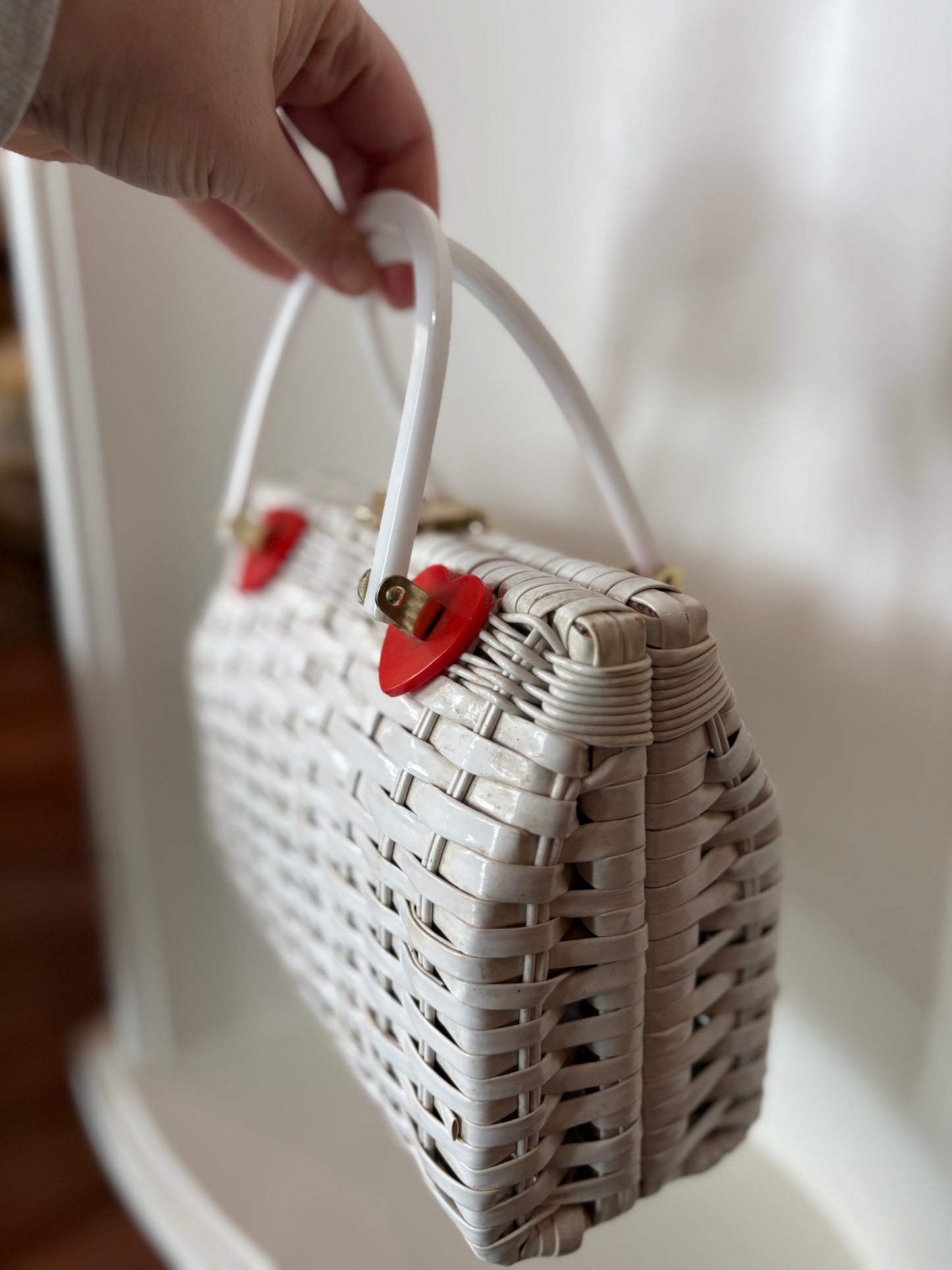 White wicker purse with heart details