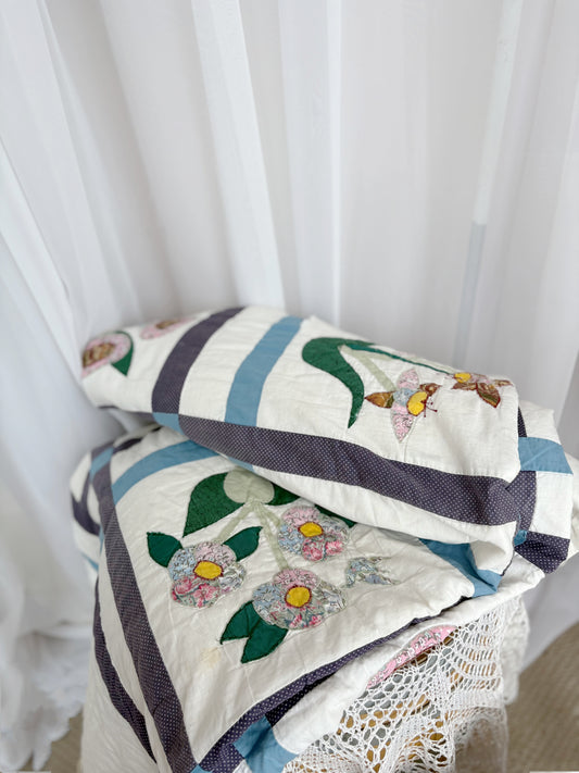 Beautiful Floral Quilt with some wear and tear