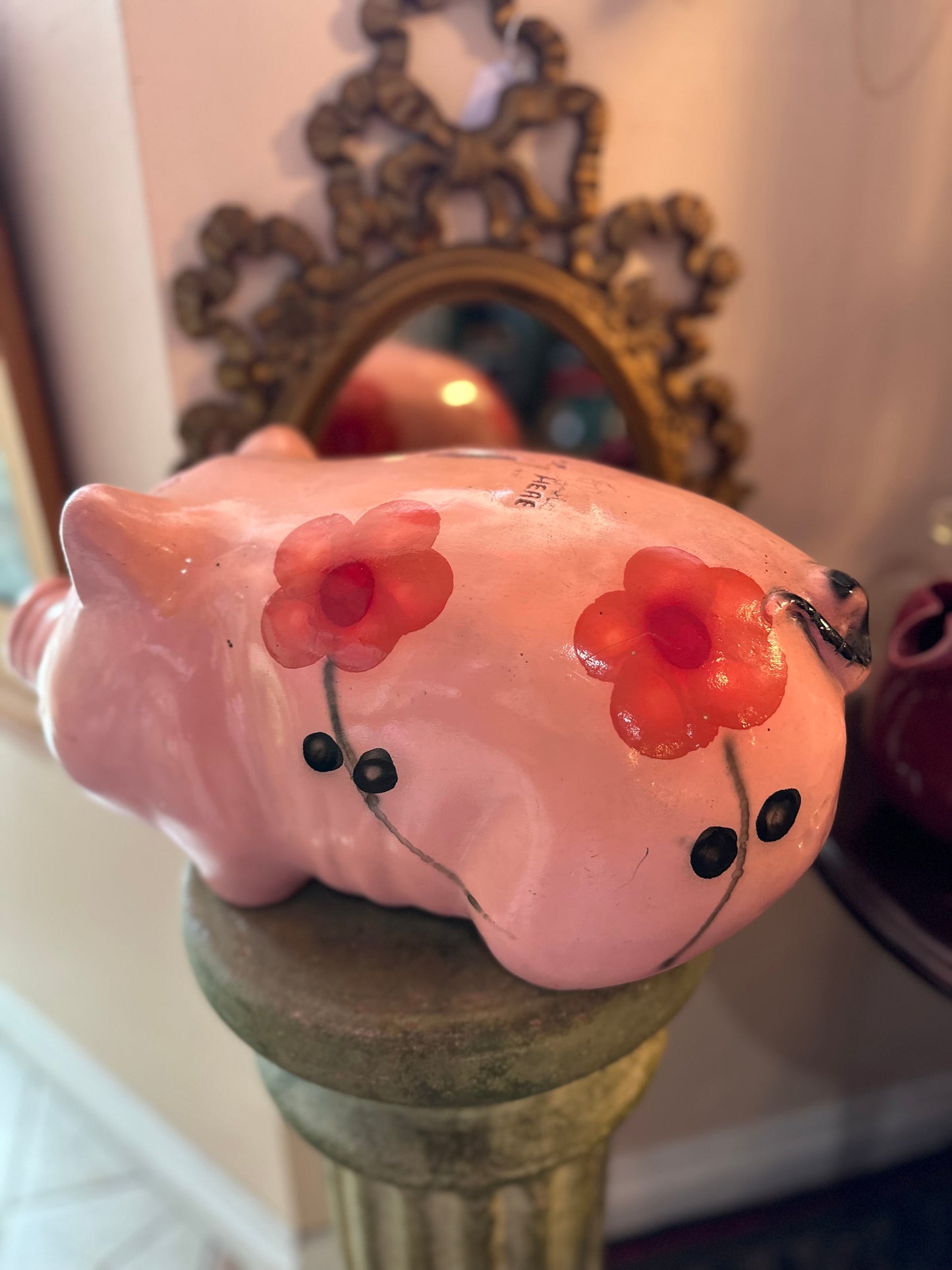 Large ceramic piggy bank with floral design