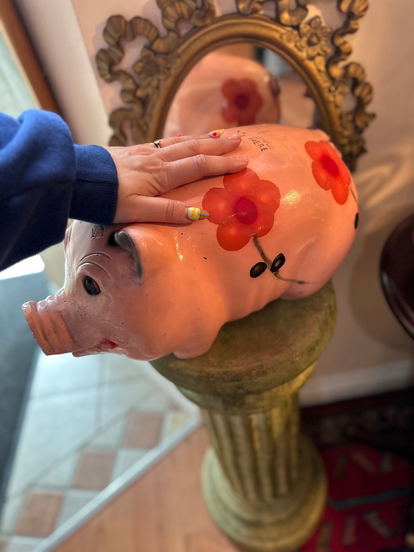 Large ceramic piggy bank with floral design