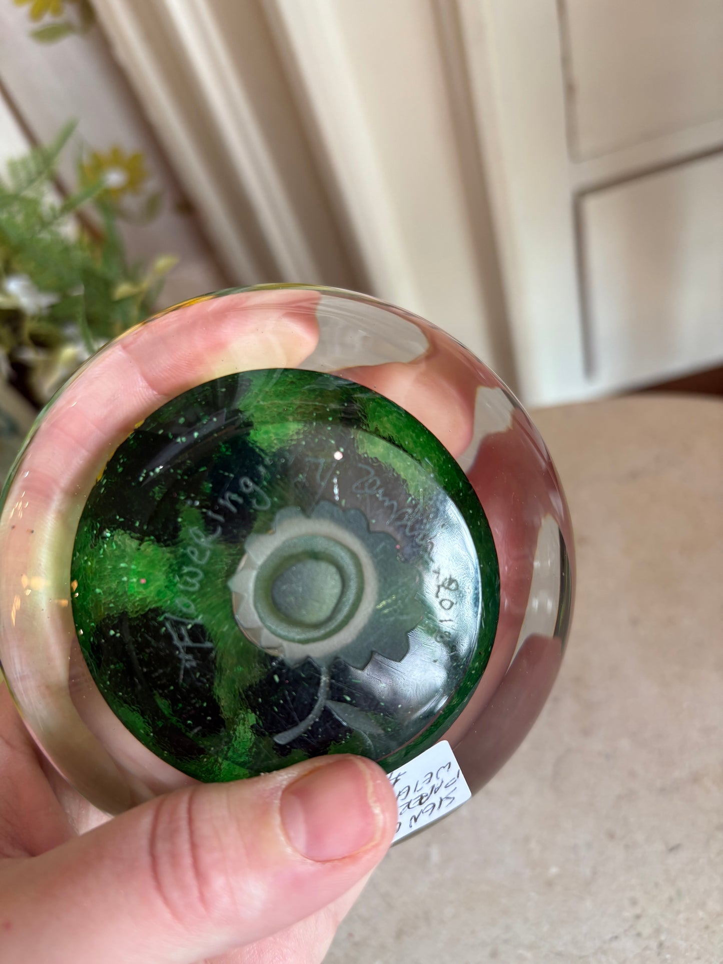 Floral signed paperweight