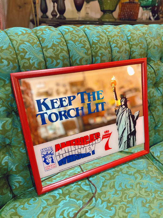 Seagram’s American Whiskey light up Statue of Liberty mirror