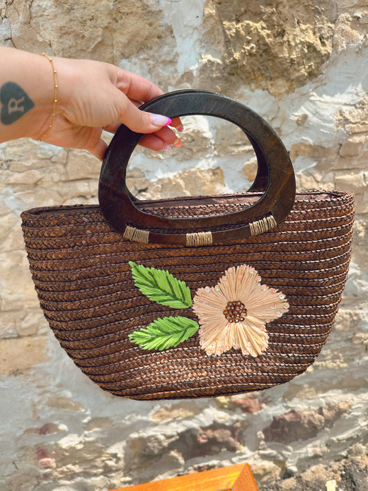 Woven handbag with flower detail