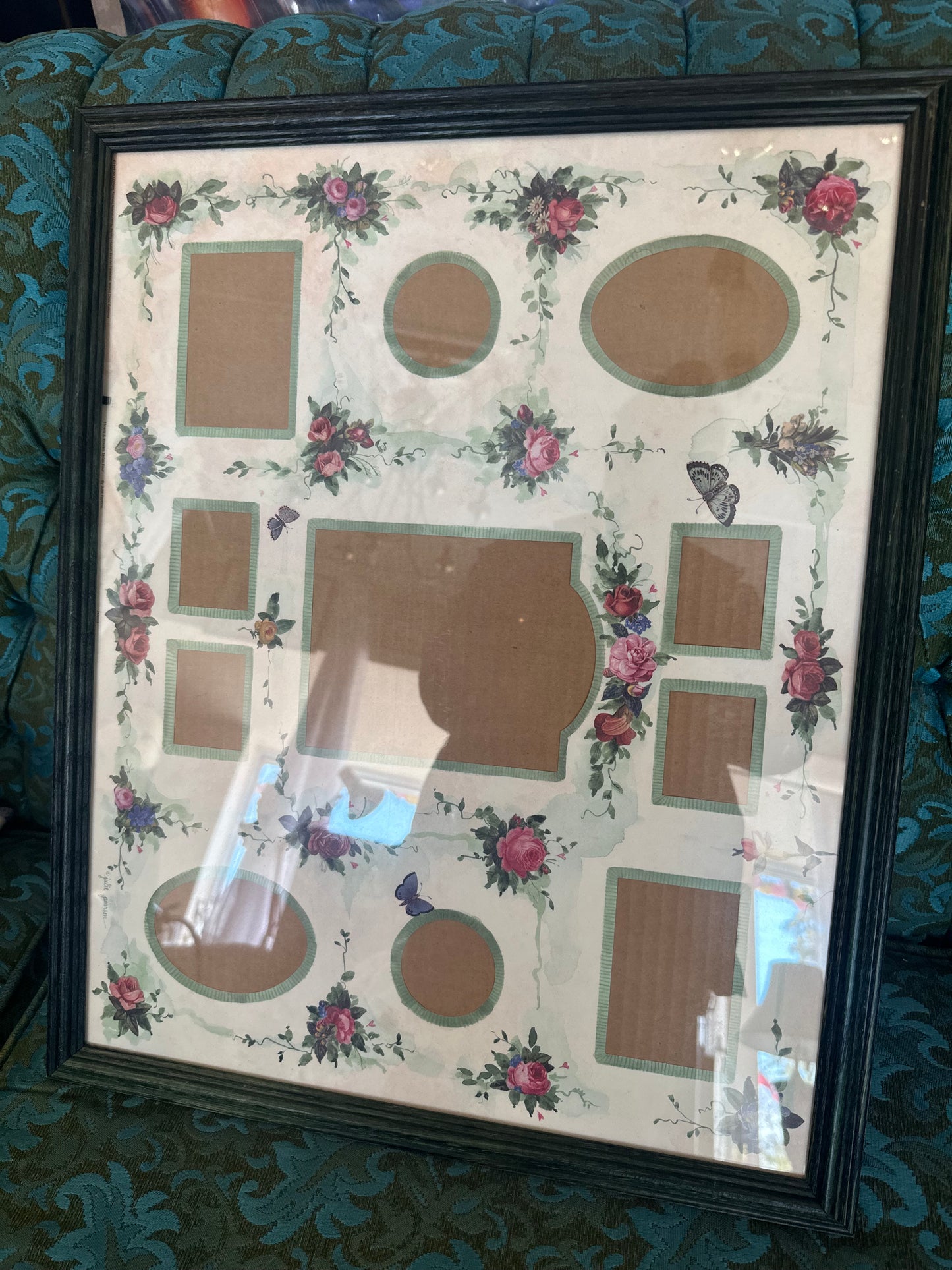 Framed and matted picture frame for 11 photos