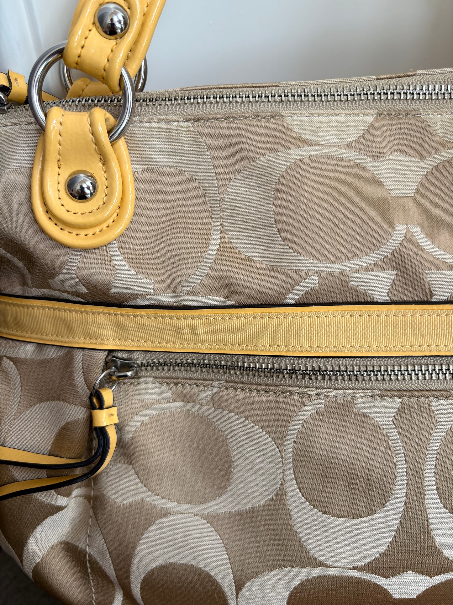 CC Monogram pattern coach handbag with yellow details