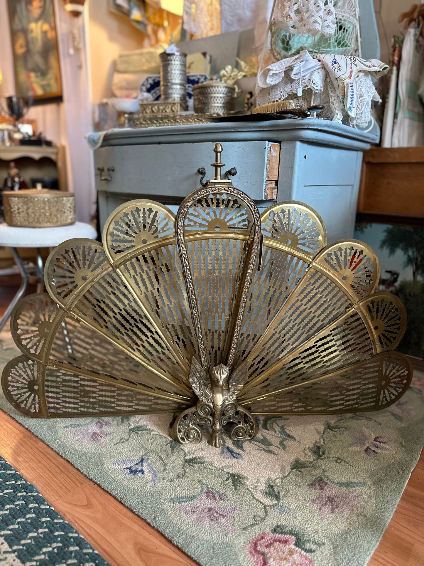 Brass fireplace fan screen with winged Gargoyle