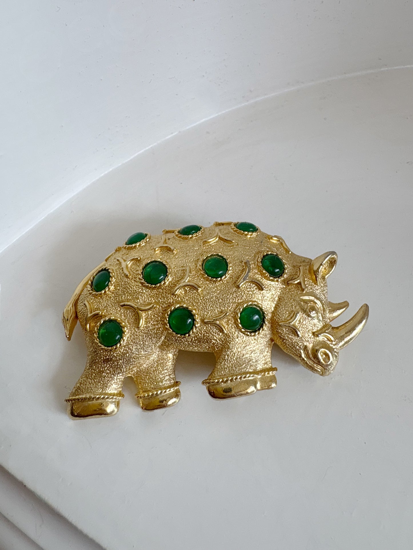 Brooch #17 -Capri Rhino with green glass cabochons
