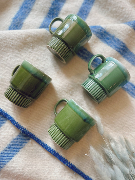 Set of 4 mid century green pottery mugs