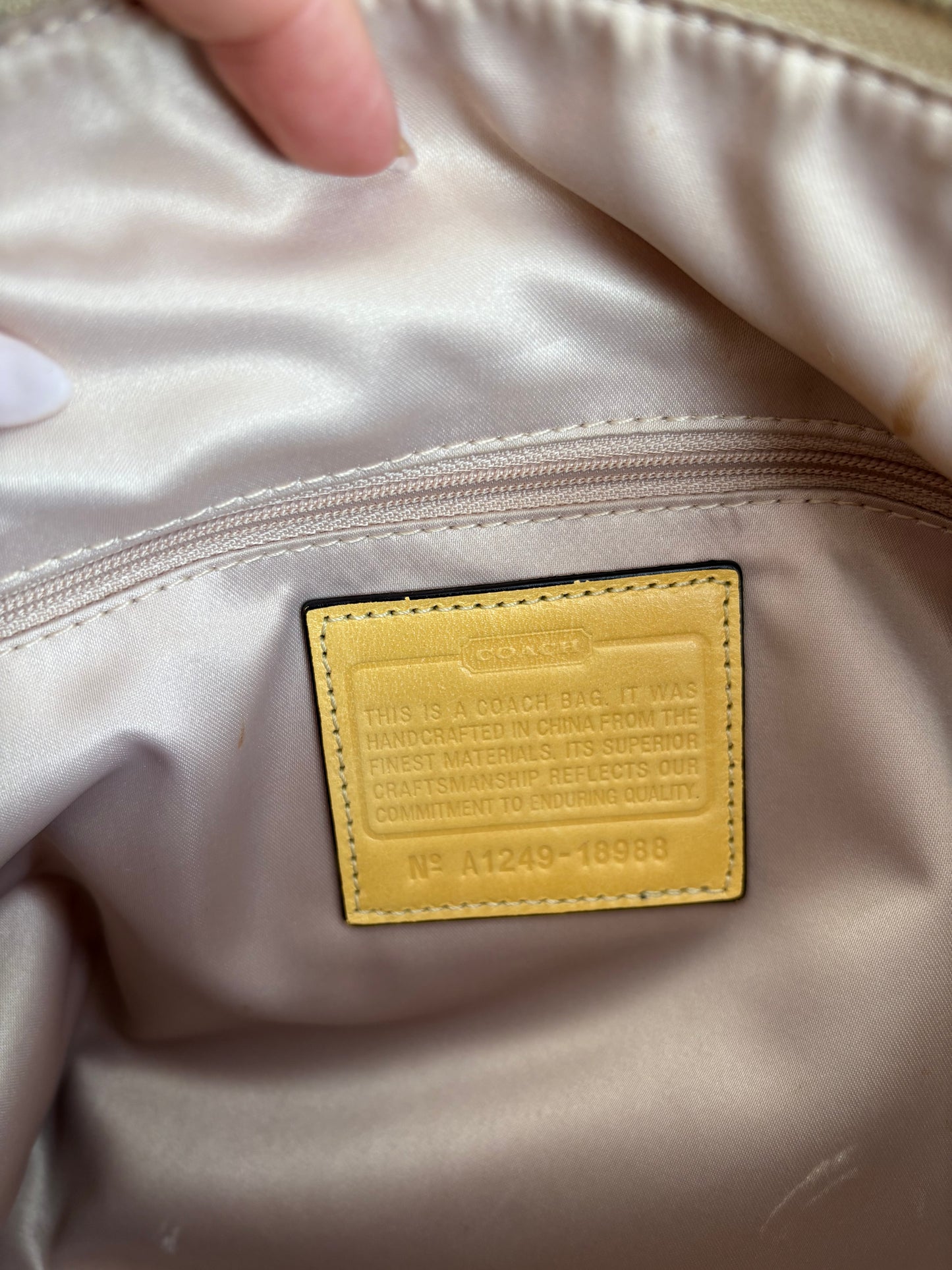 CC Monogram pattern coach handbag with yellow details