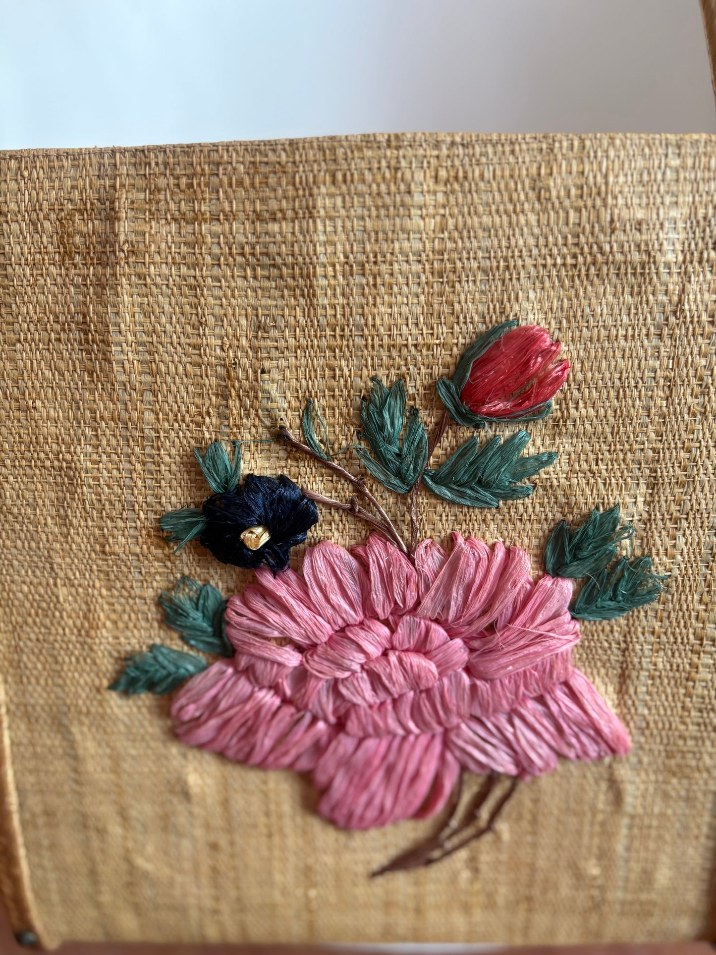 Vintage Rattan purse with floral details