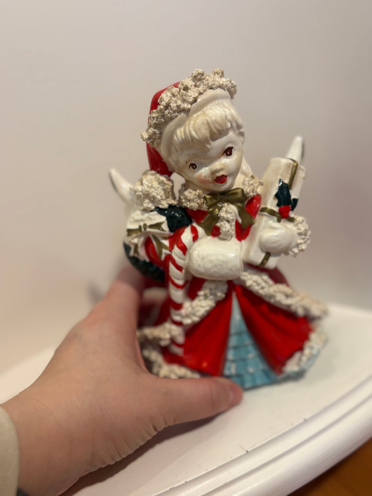 Napco Christmas Shopping Girl Planter- candy cane and gifts