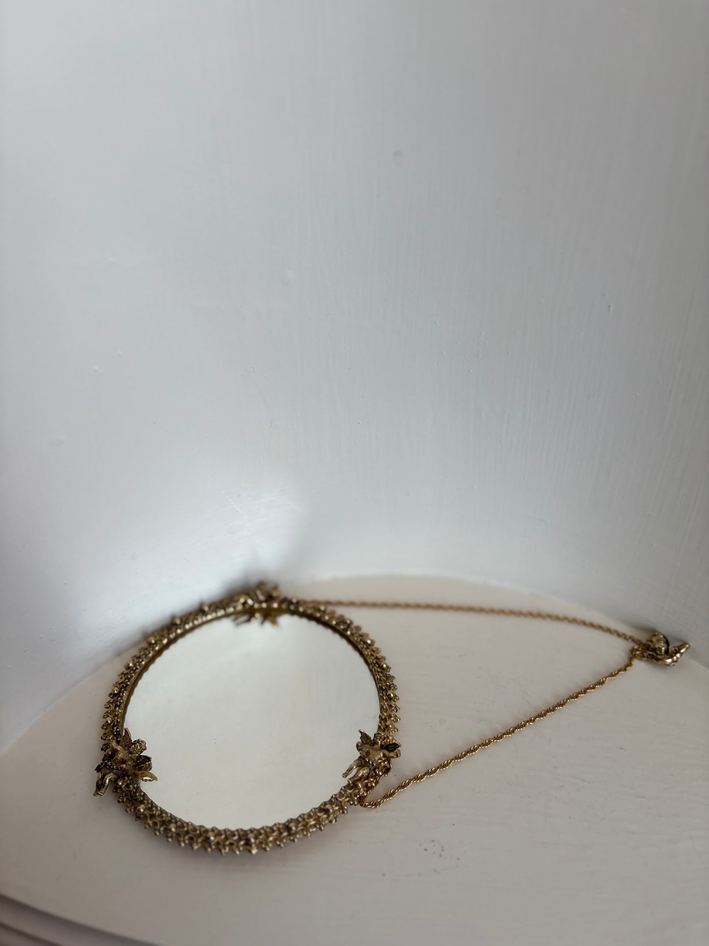 Wall hanging brass cherub mirror - made in Germany
