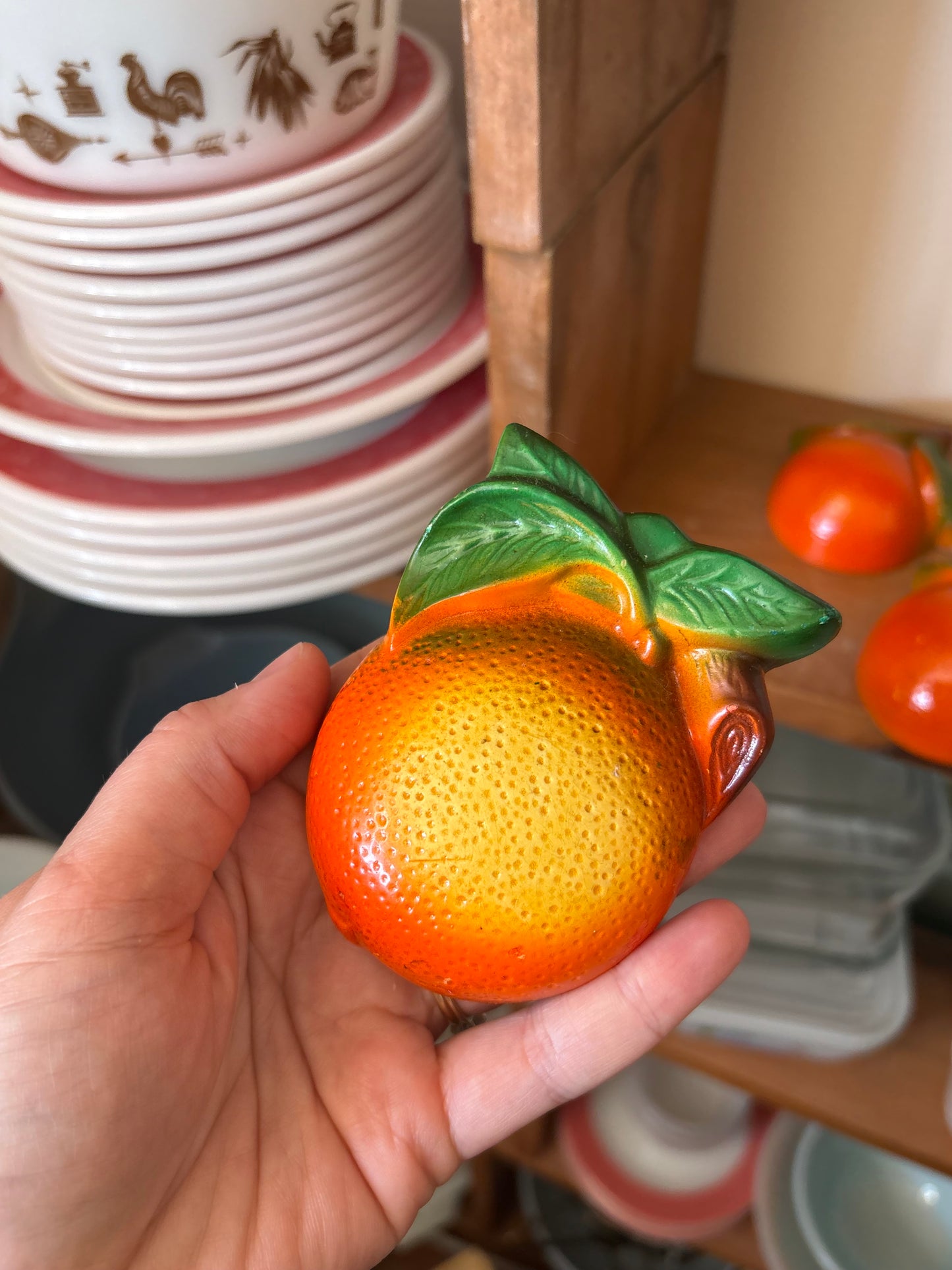 Chalkware hanging oranges