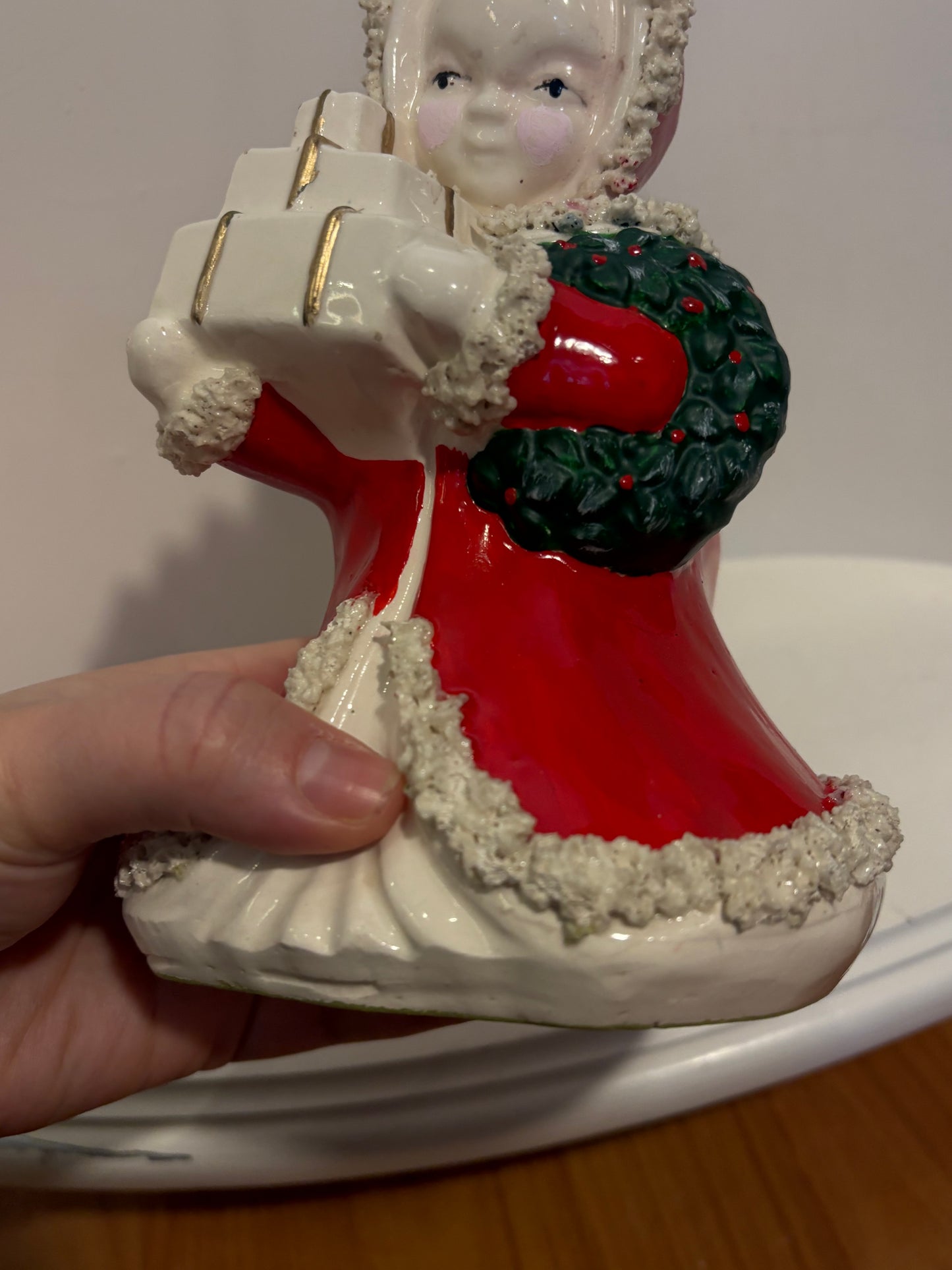 Christmas Shopping girl planter  with presents and wreath