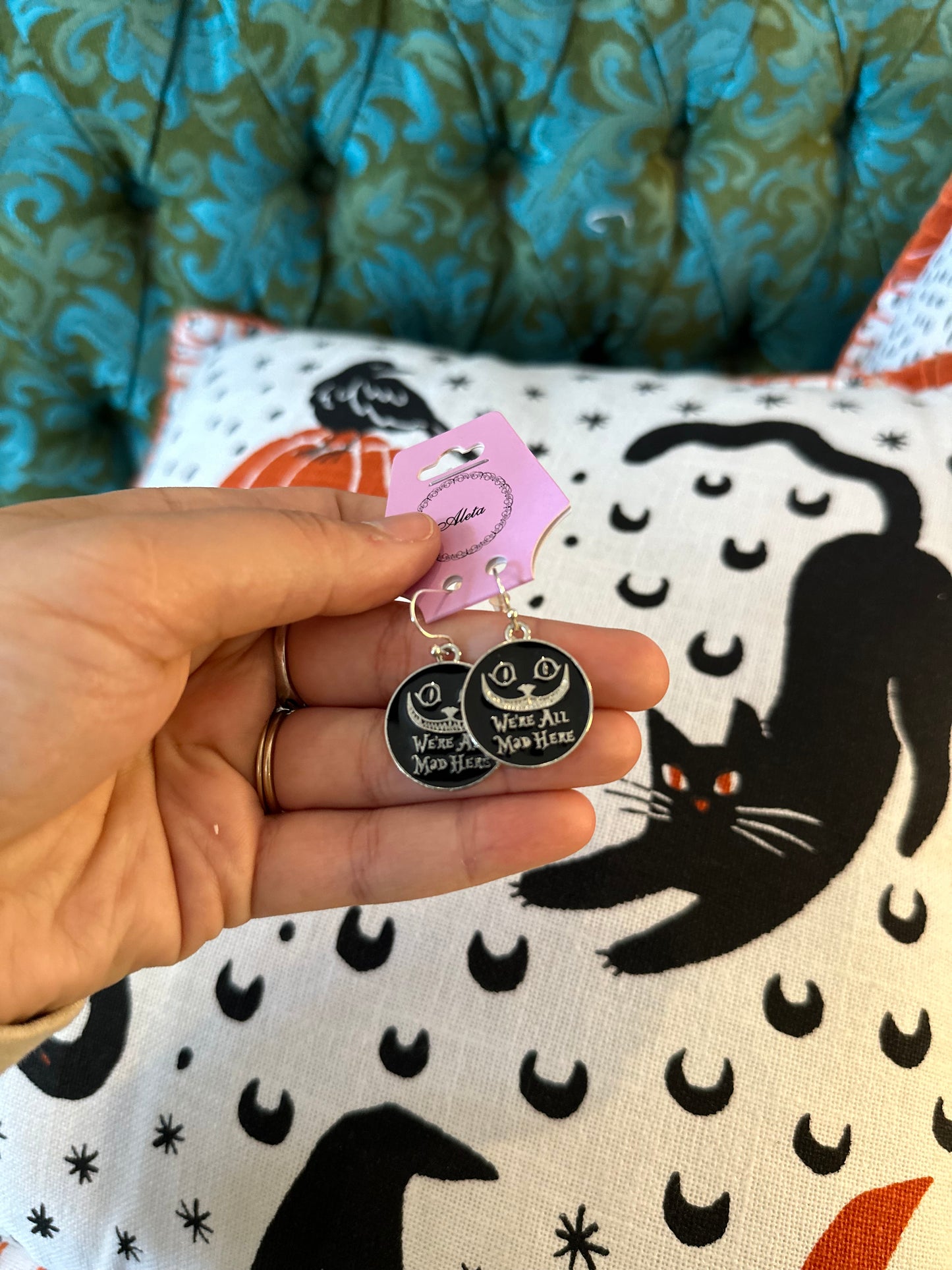 “We’re All Mad Here” Cheshire Cat earrings