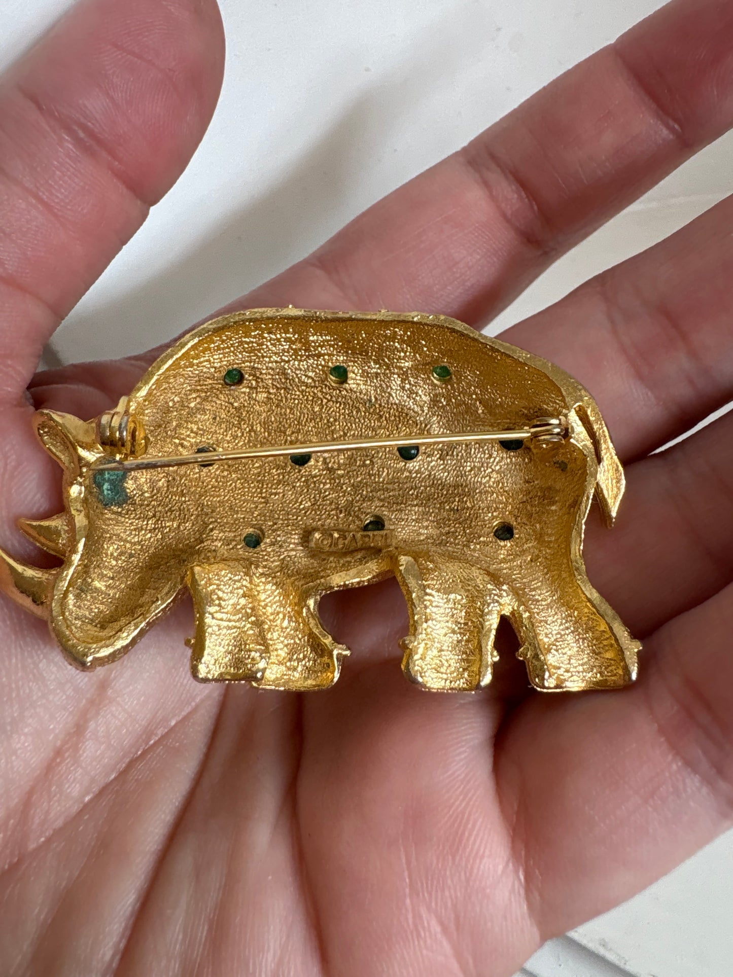 Brooch #17 -Capri Rhino with green glass cabochons