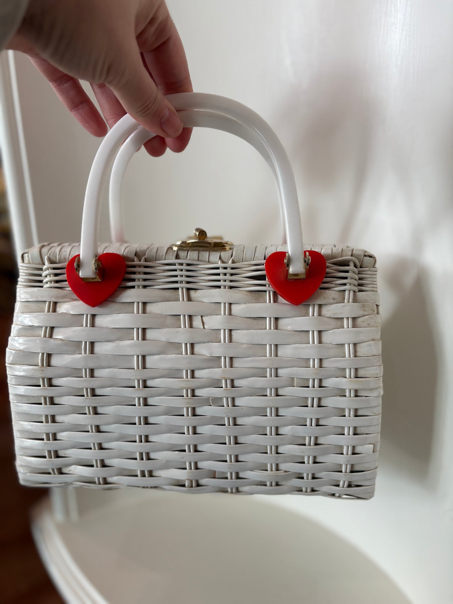 White wicker purse with heart details