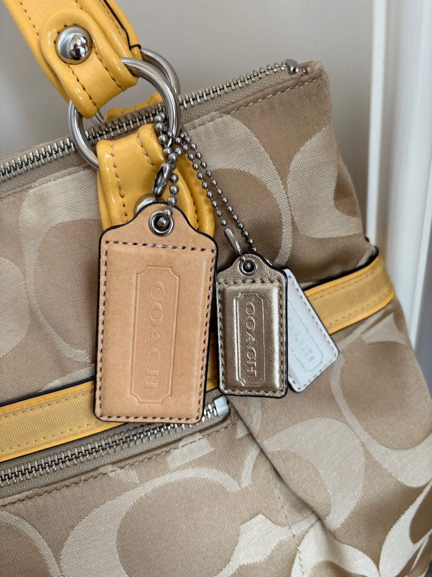 CC Monogram pattern coach handbag with yellow details