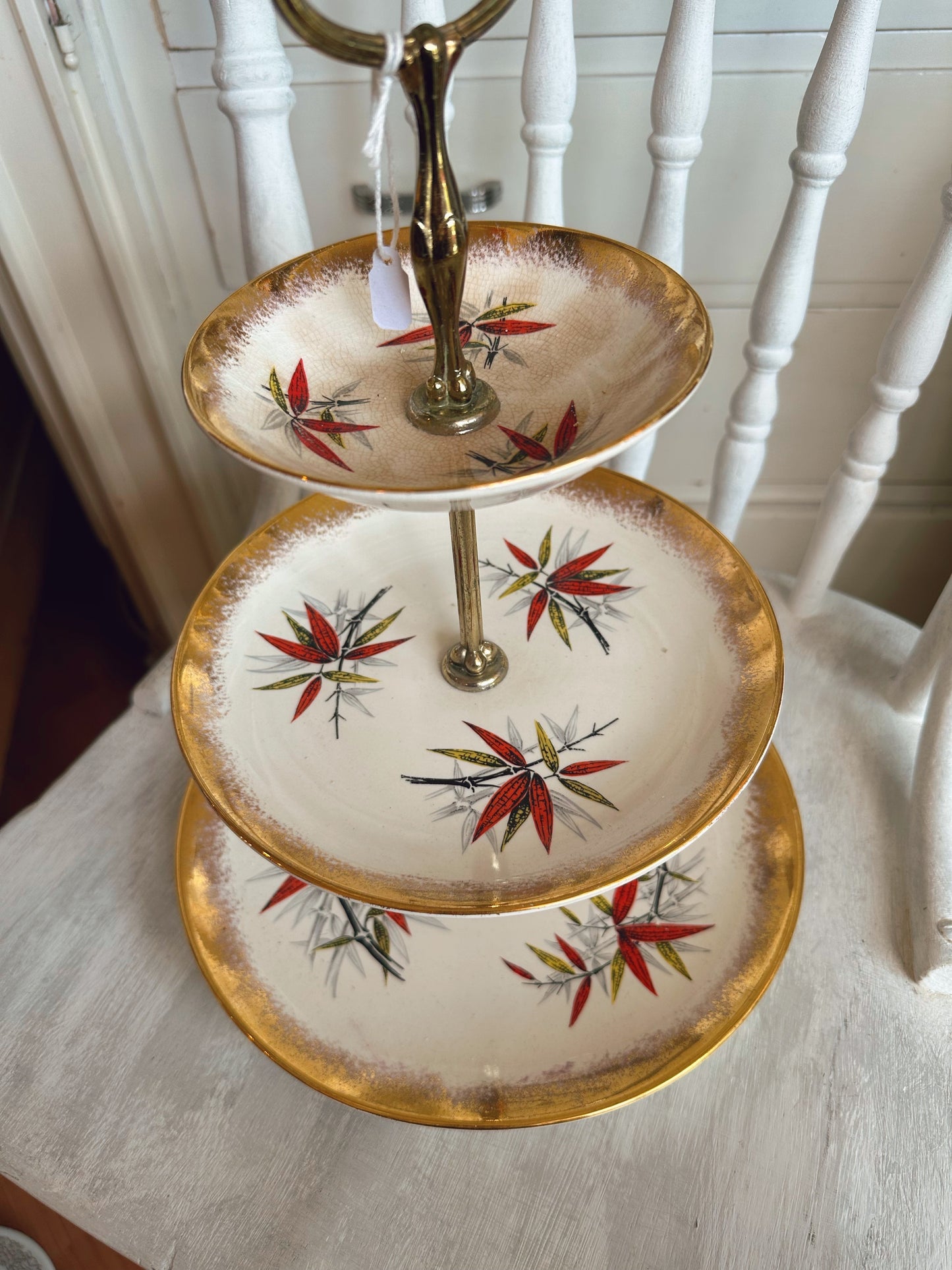 Three tier plate tray with gold trim