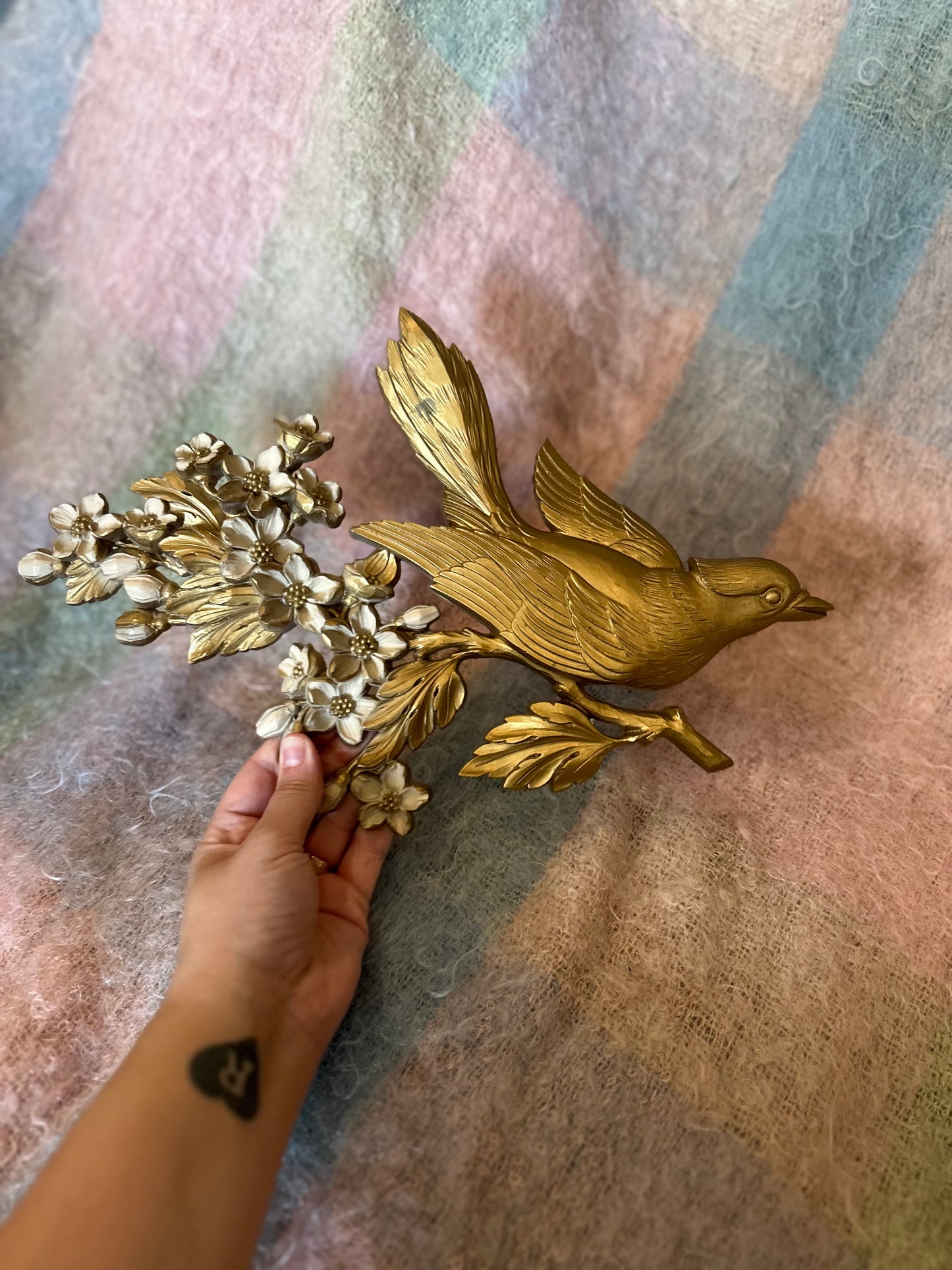 Resin bird wall art with flower detail