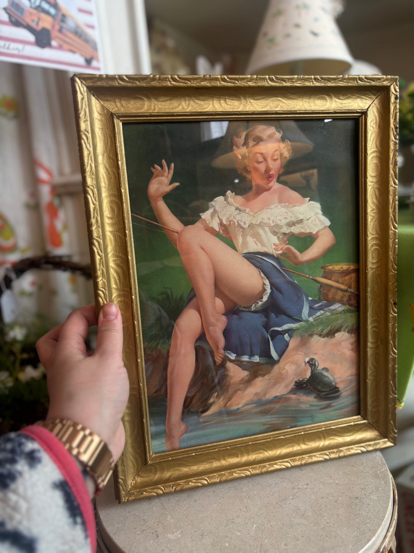 Framed Sales Calendar Advertisements - woman near the water with turtle