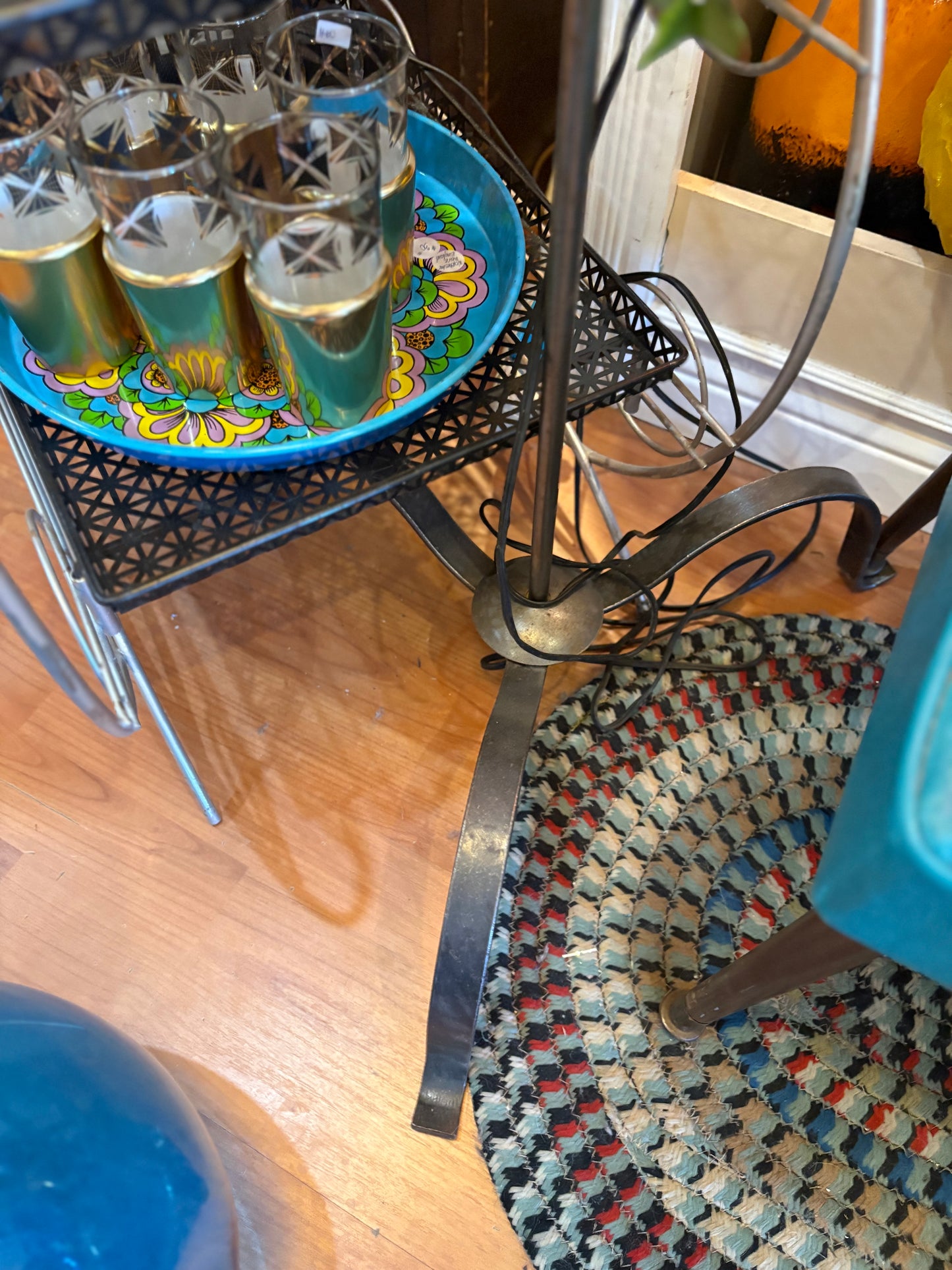Metal floor lamp with green shade