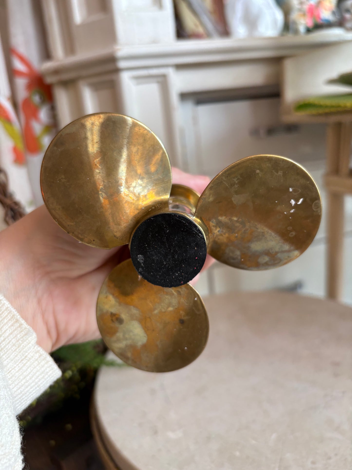 Brass propeller candle holder