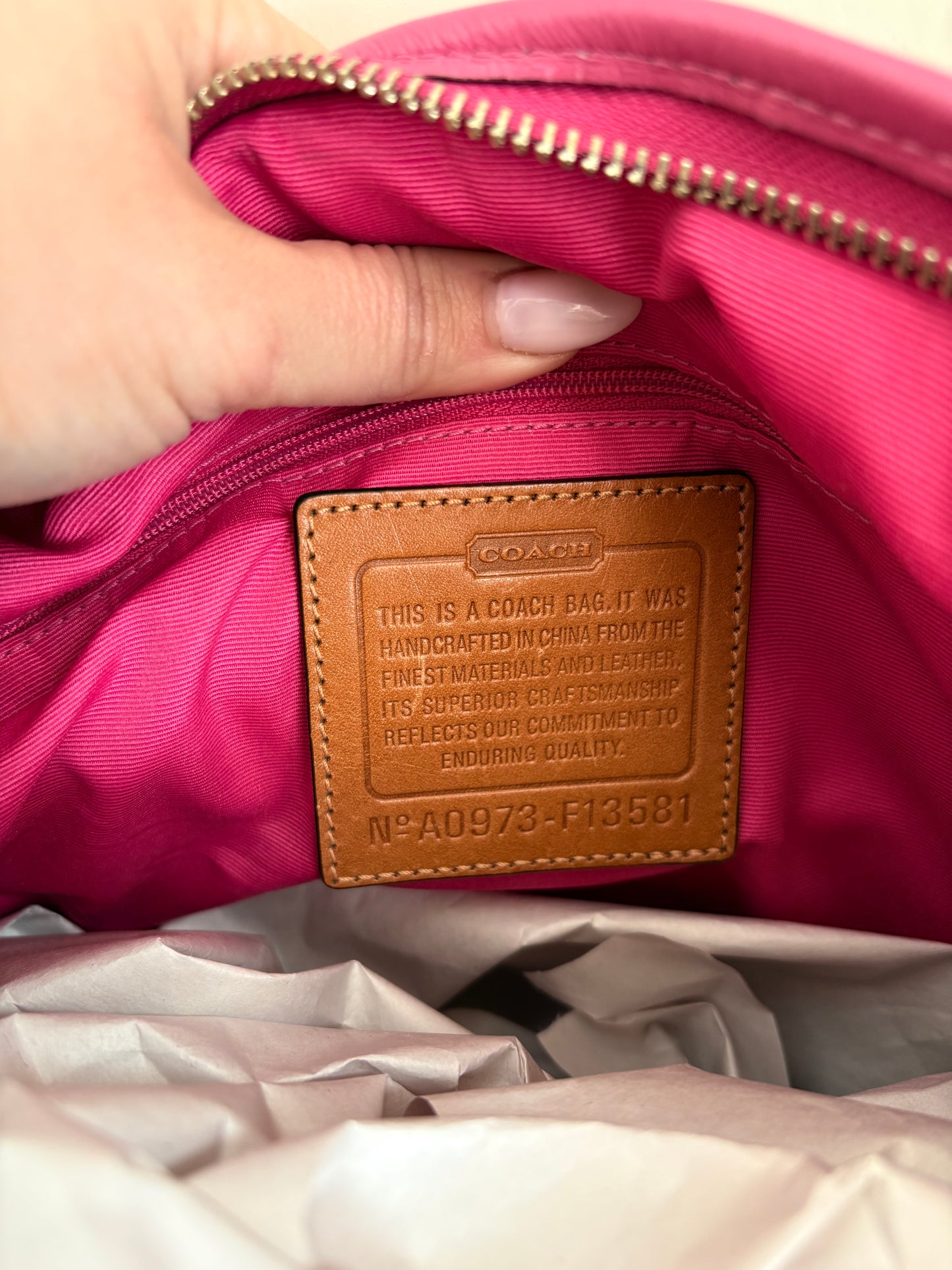 Coach CC Monogram pattern purse with pink details