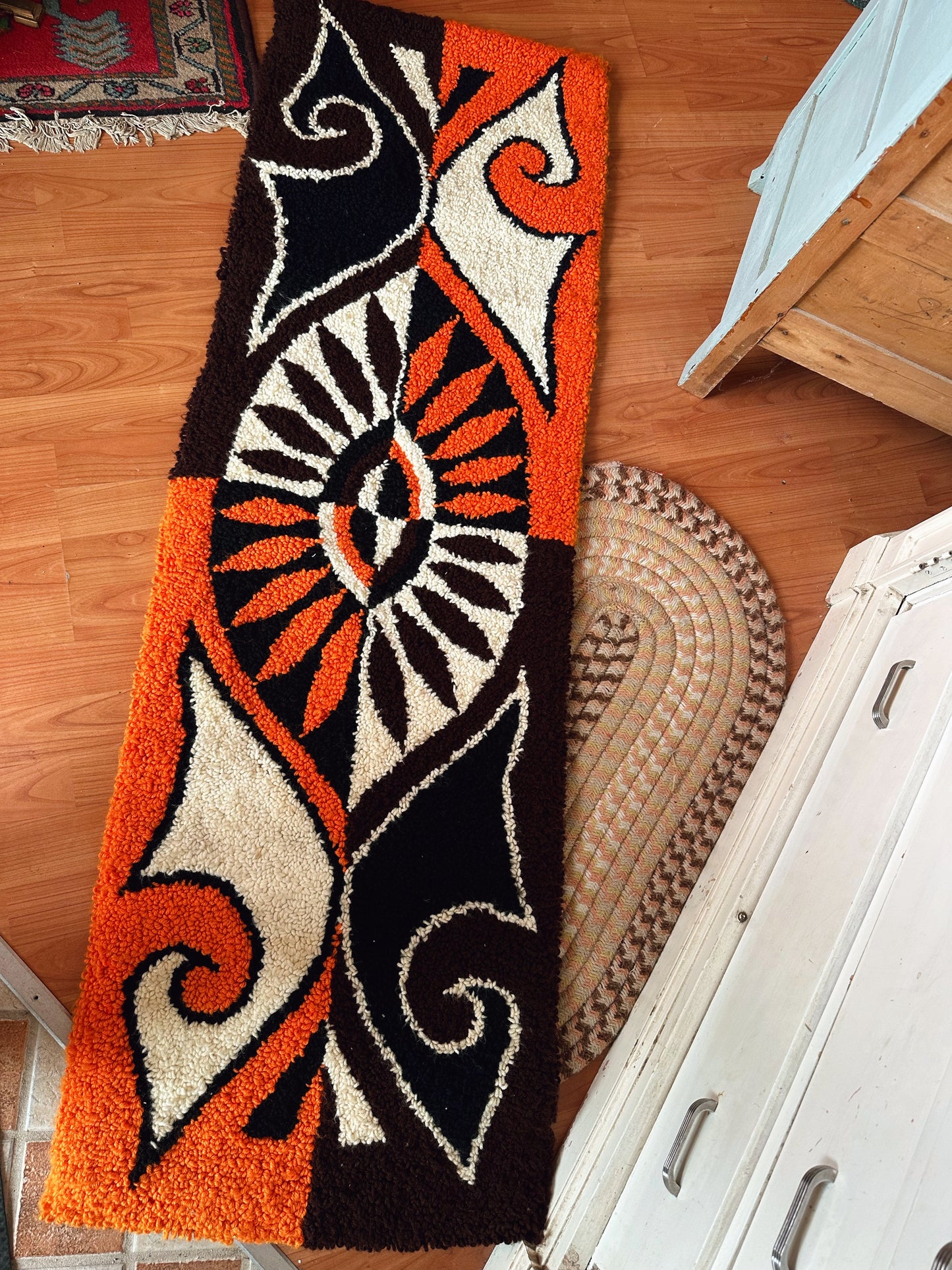 Retro rug in bright orange & brown