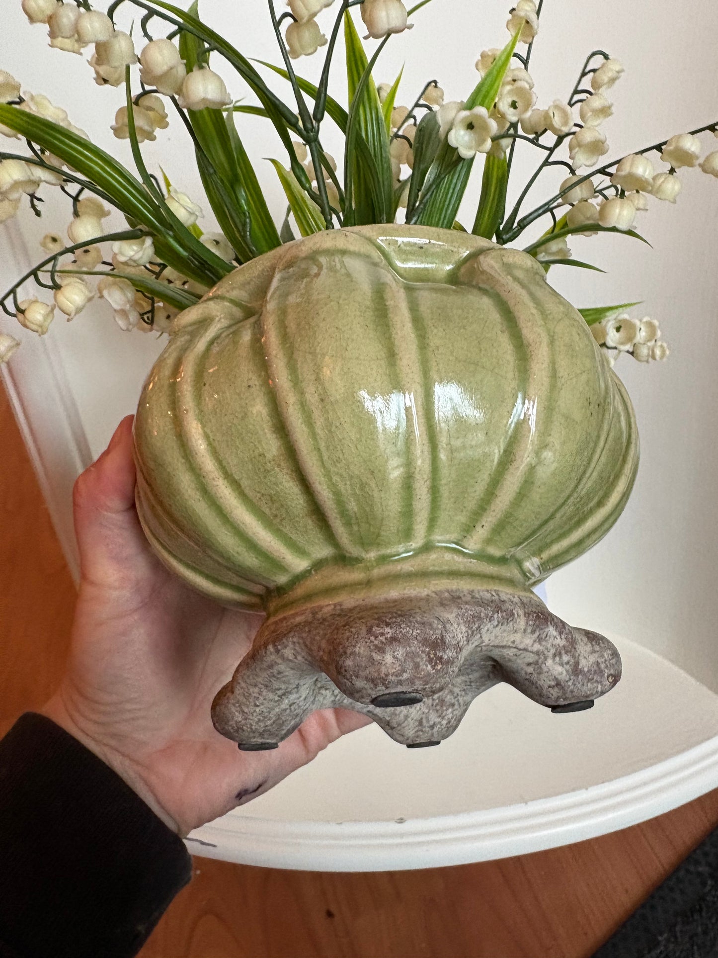 Faux Lily of the Valley in pottery vase