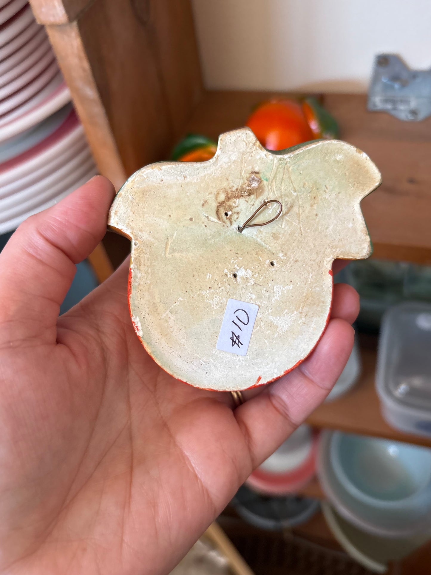 Chalkware hanging oranges