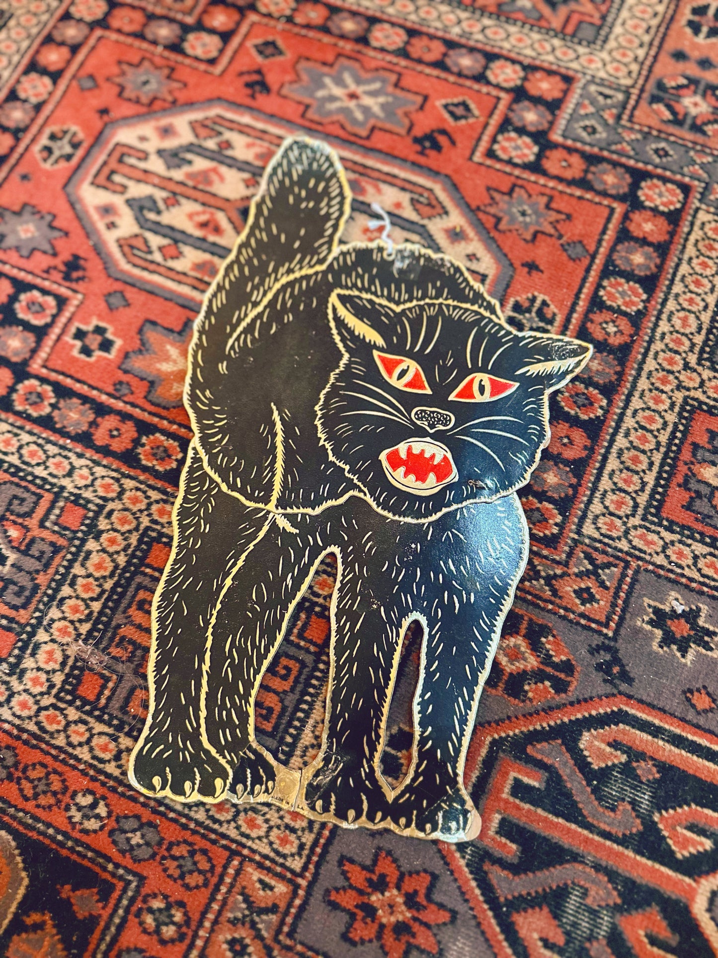 Vintage metallic cat cutout