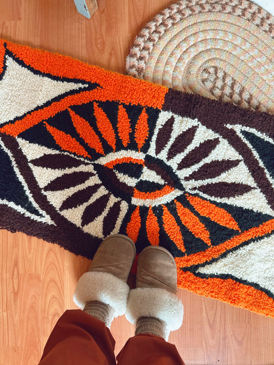 Retro rug in bright orange & brown